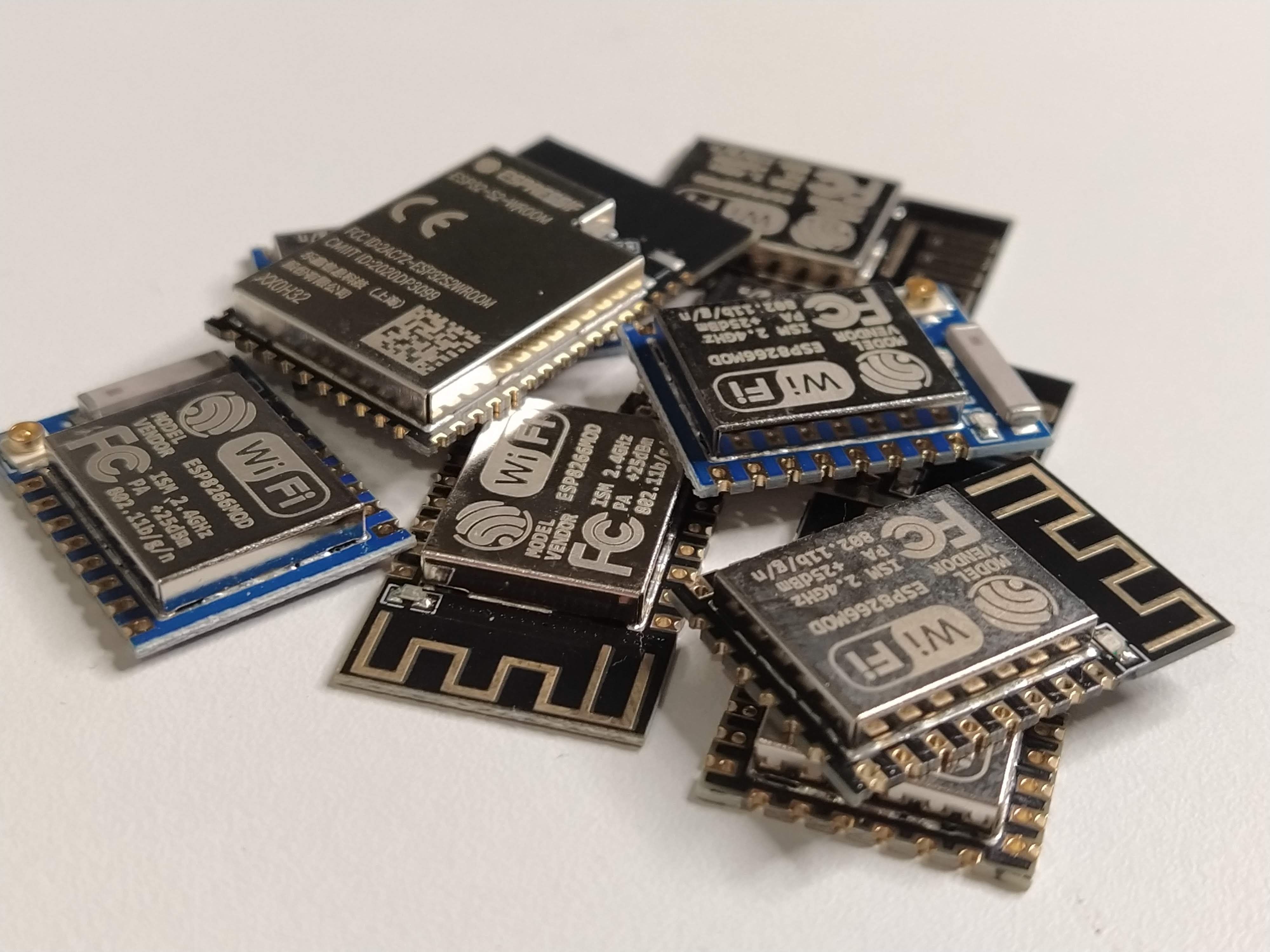 A bunch of ESP8266 and ESP32-S2 modules.